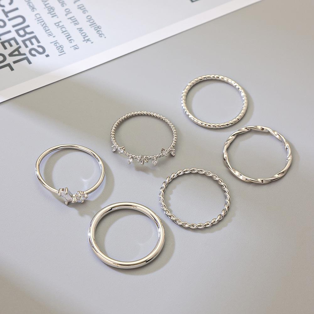 Korean Style Zirconium Braided Ring: Smooth, Fashionable Design for Women