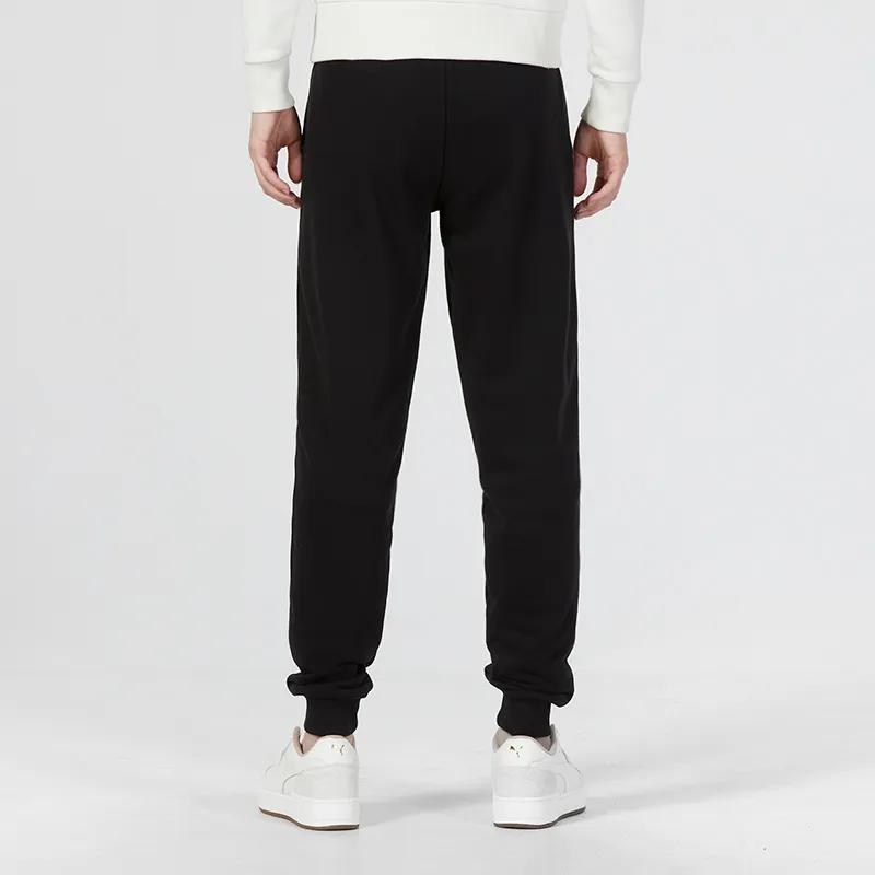PUMA Knitted Sweatpants Men's Black Moderate Cuffed Pants (Unisex) Knitted Sweatpants 675744 01