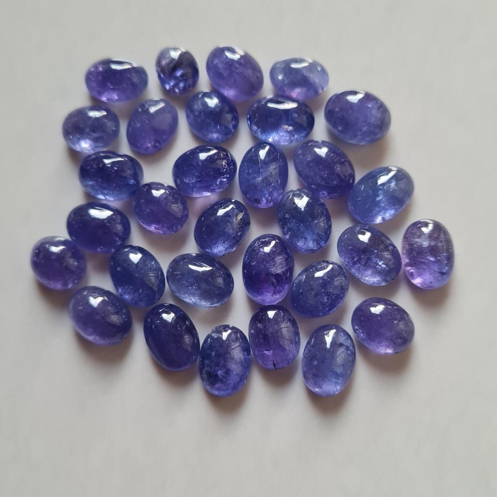 Натуральный танзанит кабошон овальной формы калиброванный размер хорошее качество танзанит россыпью камни для изготовления ювелирных изделий.