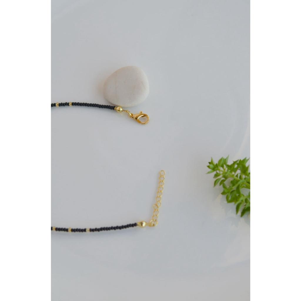 Черные бусины от сглаза