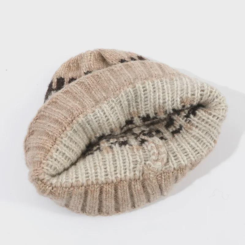 Шапка из шерсти с жаккардовым узором «Фэр-Айл» тройного сложения: Модные, теплые наушники для осени и зимы