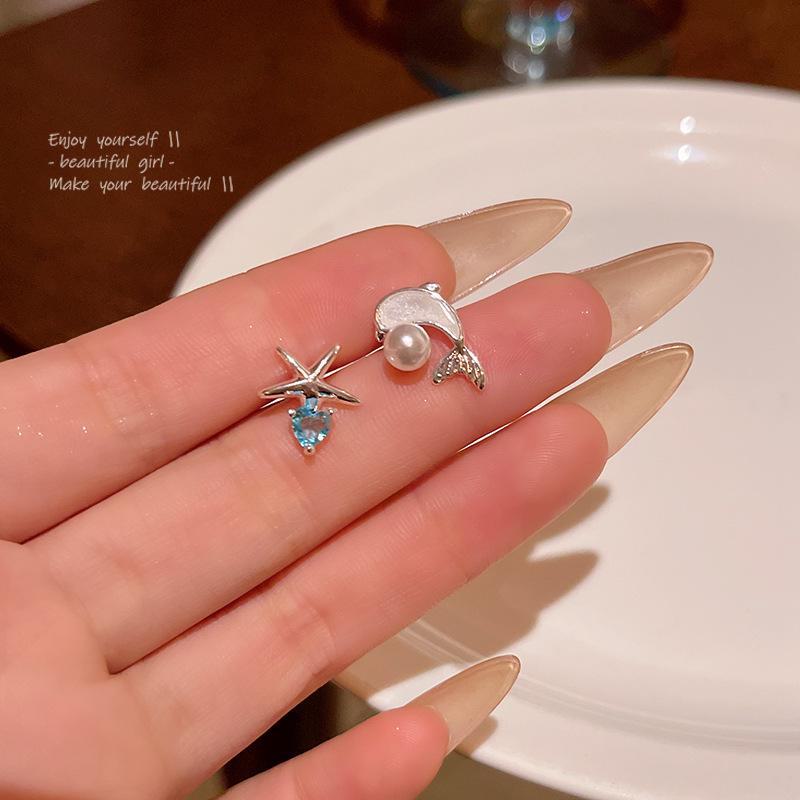 Асимметричные серьги в виде дельфина и морской звезды — женский летний морской стиль