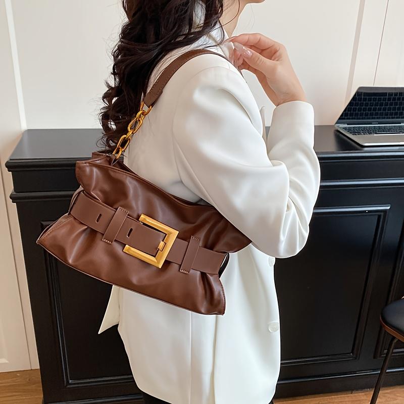 Korean style women's underarm bag - a stylish and simple soft leather pleated tote bag with elegant and exquisite belt buckle details for commuting.