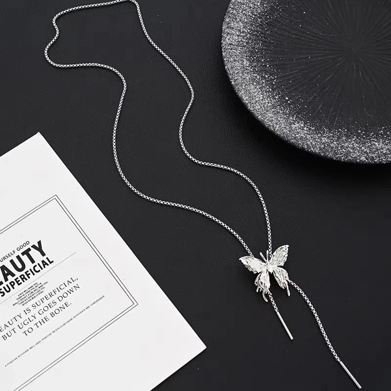 Premium Sense Can Pull Silver Butterfly Fringed Necklace Design Fashion Autumn And Winter Sweater Chain Collarbone Chain Jewelry
