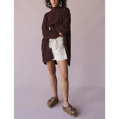 Женский осенне-зимний уличный свитер средней длины с разрезом и однотонным узором