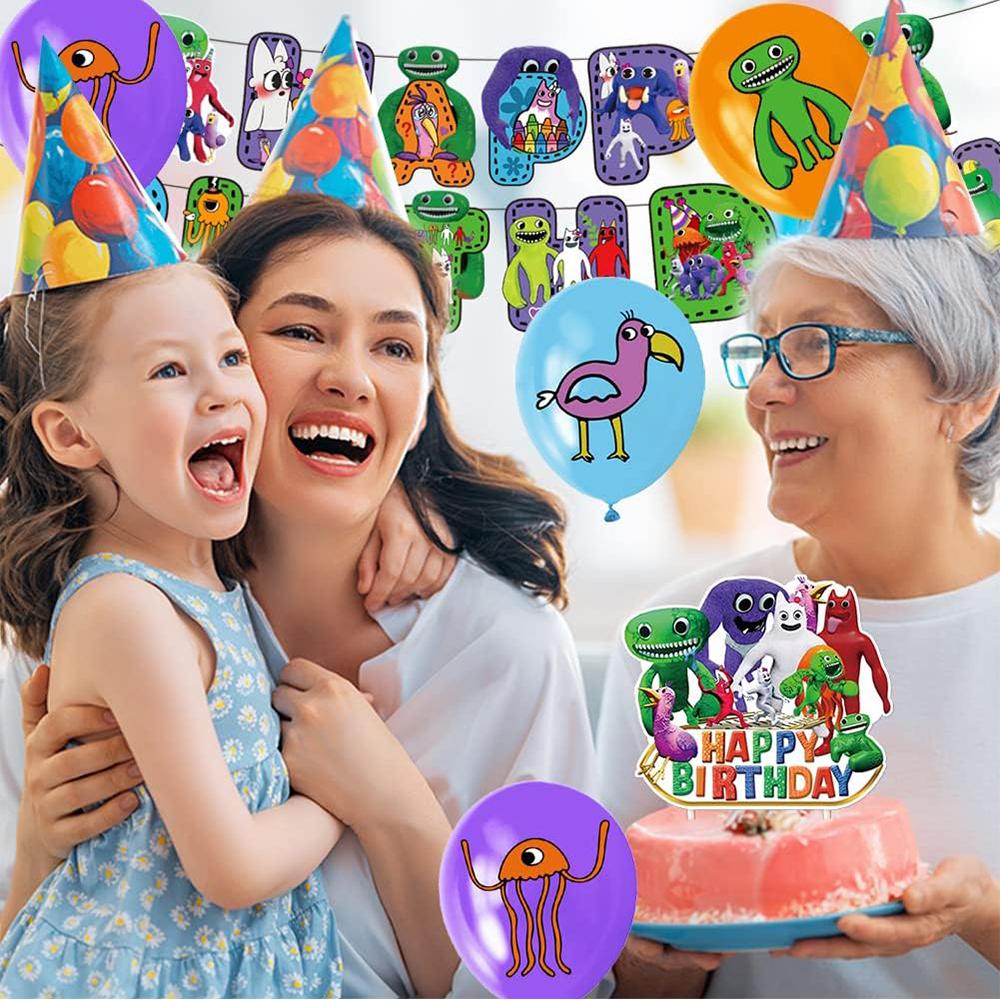 Декорации для тематической вечеринки «Сад Банбана» включают воздушные шары для торта и баннера.