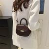 Весенняя нишевая мода сумка на одно плечо популярная однотонная сумка новая тенденция простая косая сумка-седло для通勤