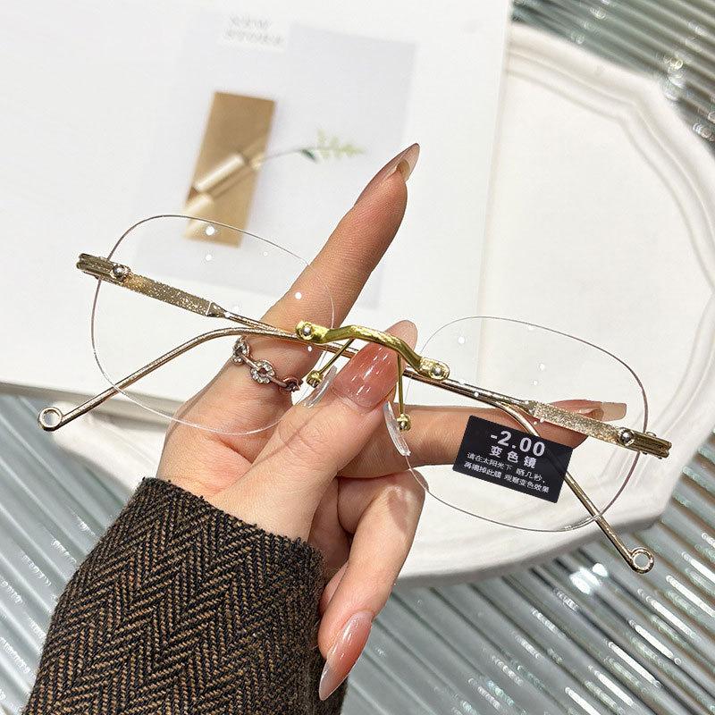 New elliptical frameless photosensitive color-changing glasses plain face thin Internet celebrity flat mirror can be matched with degree gold wire gl