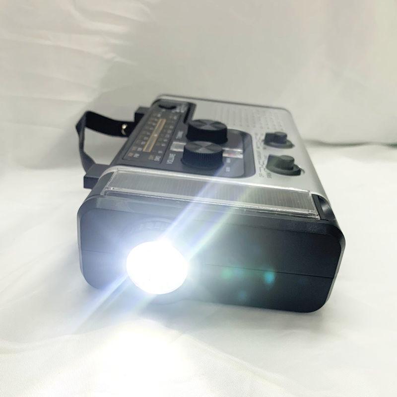 Радиоприемник на солнечных батареях с ручным приводом и фонариком для пожилых людей