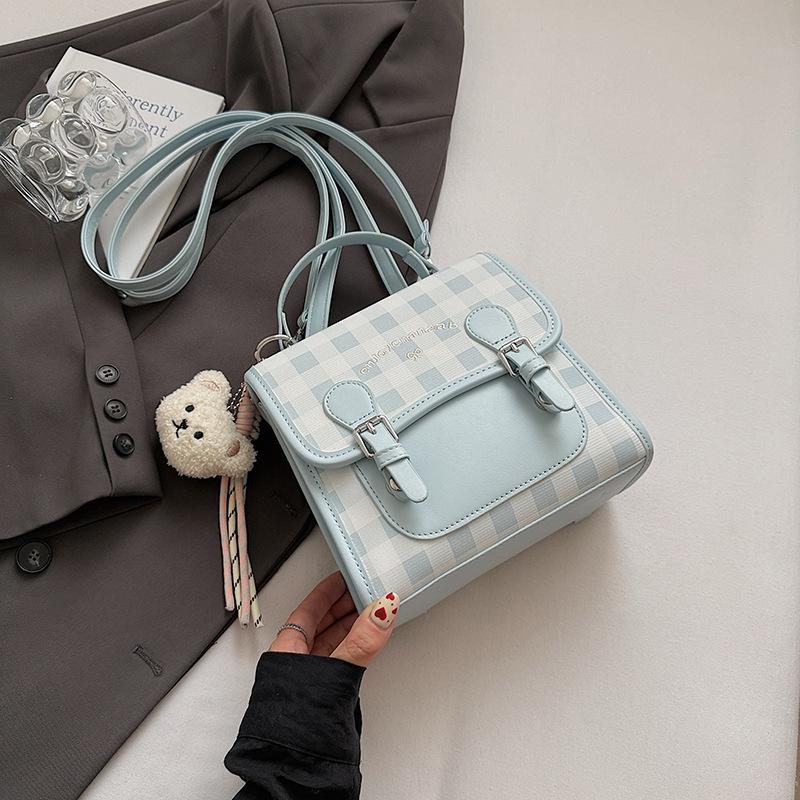 Casual plaid women's backpack 2025 summer new small backpack high value contrasting color portable small schoolbag