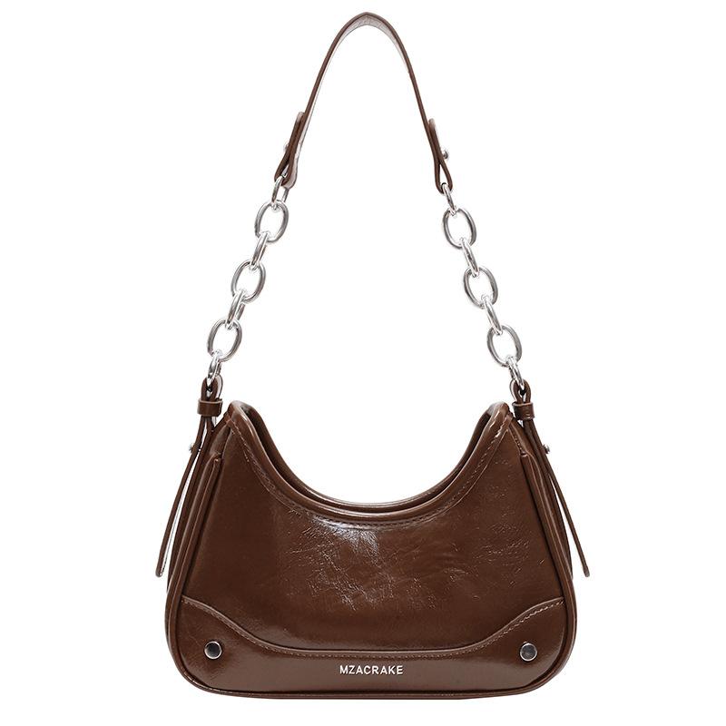 2025 new French fashionable solid color texture shoulder underarm bag women's trend simple personality commuter messenger bag