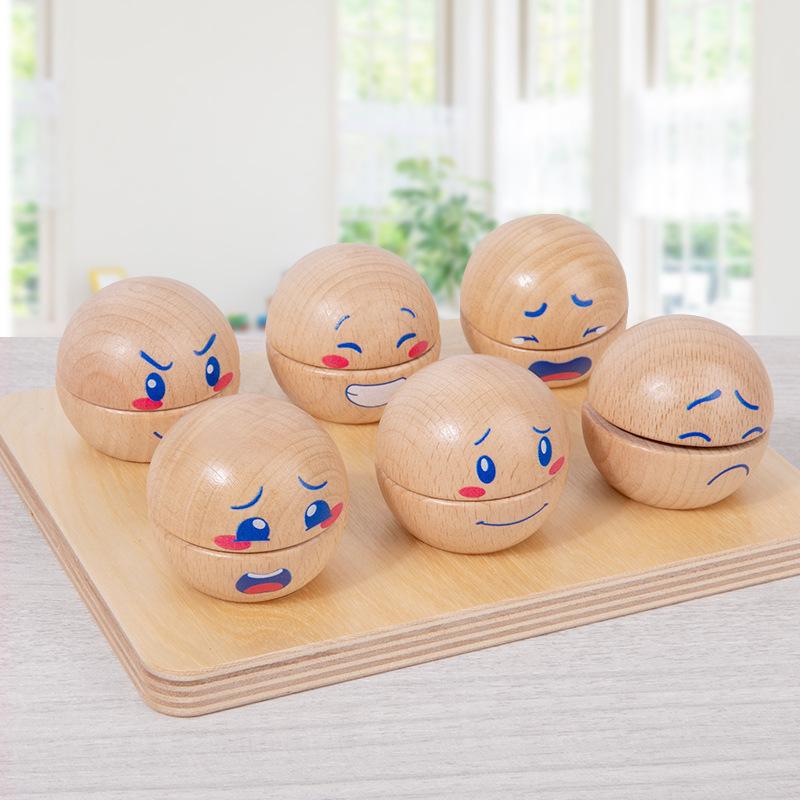 Раннее образование Деревянный мяч для выражения эмоций Выражение парных строений Детский тренинг концентрации внимания Раннее образование Развивающие игрушки