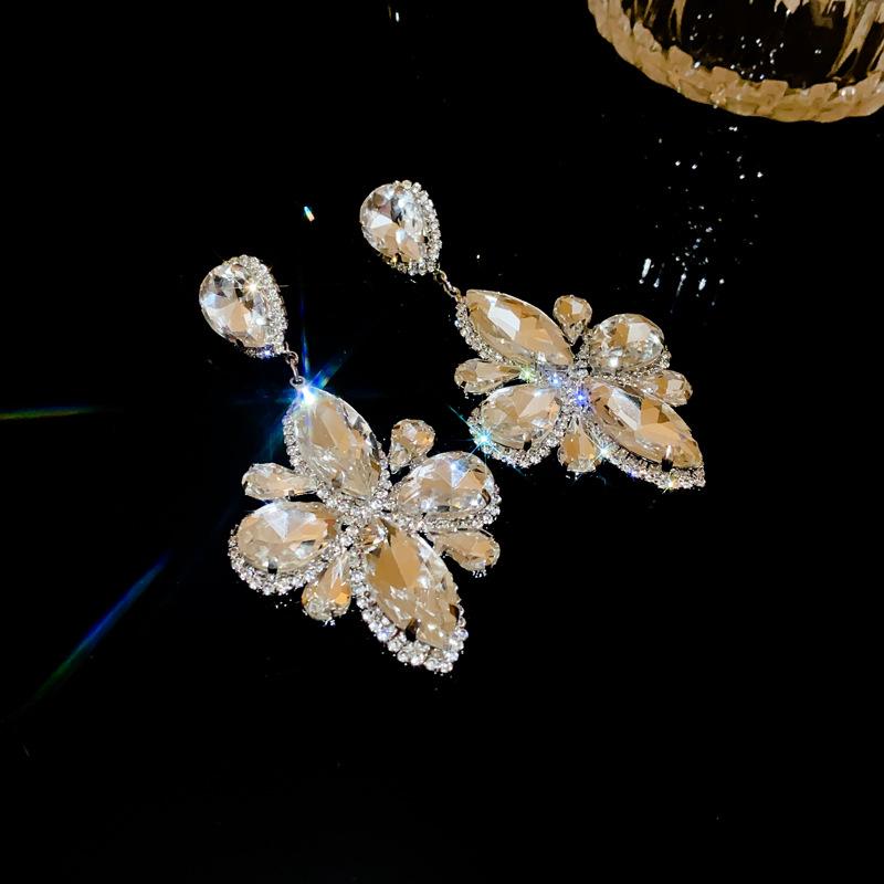 Silver needle with diamonds, water drop flower earrings, European and American exaggerated design earrings, fashionable light luxury high-end earrings