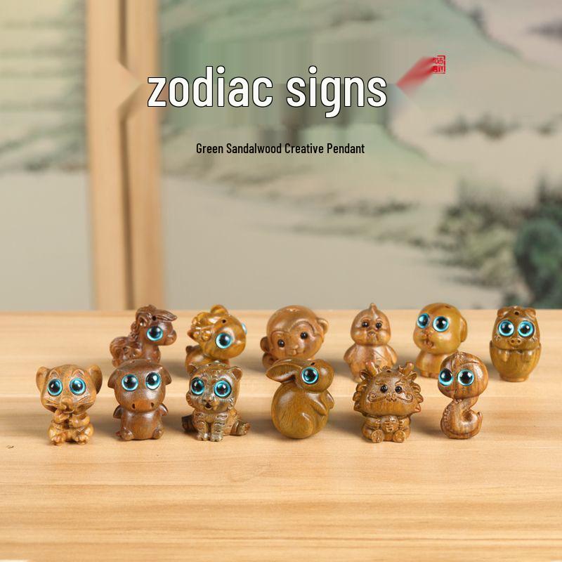Twelve Zodiac Animal Charms Green Sandalwood Set: Rat, Ox, Tiger, Rabbit, Dragon, Snake, Horse, Sheep, Monkey, Rooster, Dog, Pig.