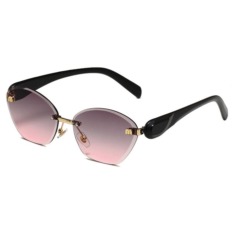 New cat eye sunglasses women's European and American fashion diamond trimmed rimless sunglasses sunglasses