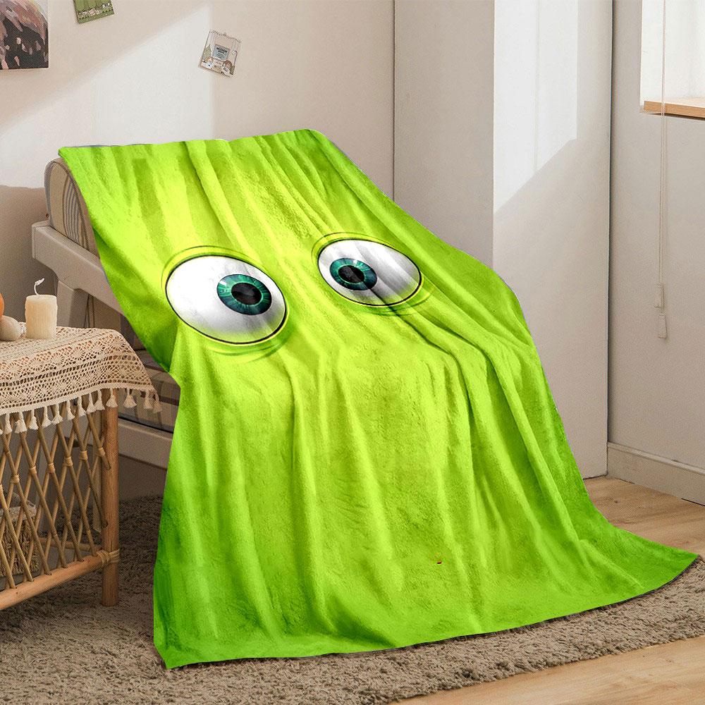 Two large, cartoonish eyes on a bright green background. for all seasons blanket lunch break throw gift