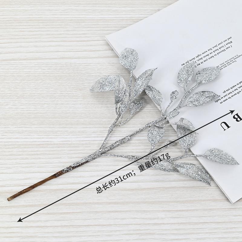 Hot-selling Christmas decoration gold powder simulation leaves, festival holly leaves, shooting props