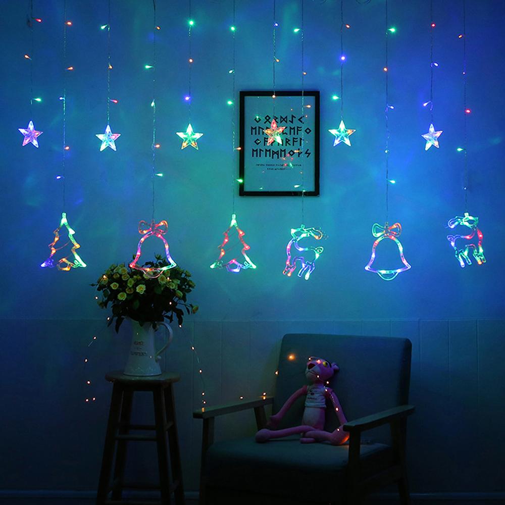 Рождественские занавески на окнах, гирлянды, колокольчики, деревья, олени, звезды, фонари, батарейки