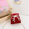 Stylish And Cute Red Pearl Handbag For Girls Featuring Adorable Butterfly Bow Accent