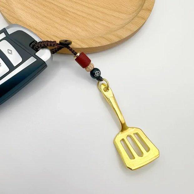 Предложение для новых клиентов: Брелок «Золотая лопата» и подвеска-скребок для скретч-карт