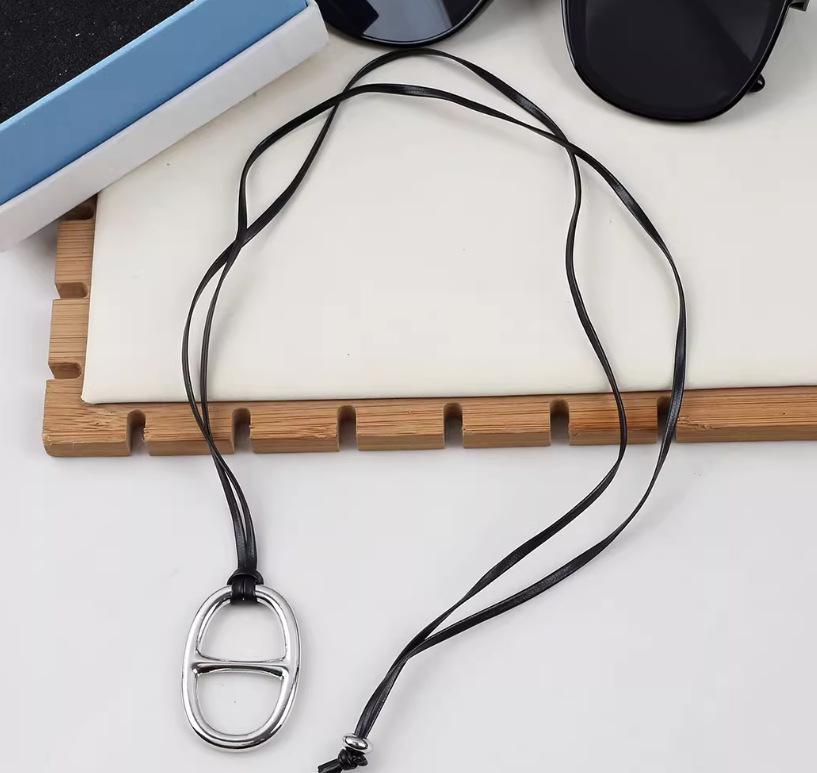 European and American Pig Nose Pendant Leather Necklace - Fashionable, Simple, All-Match Long Sweater Chain for Women