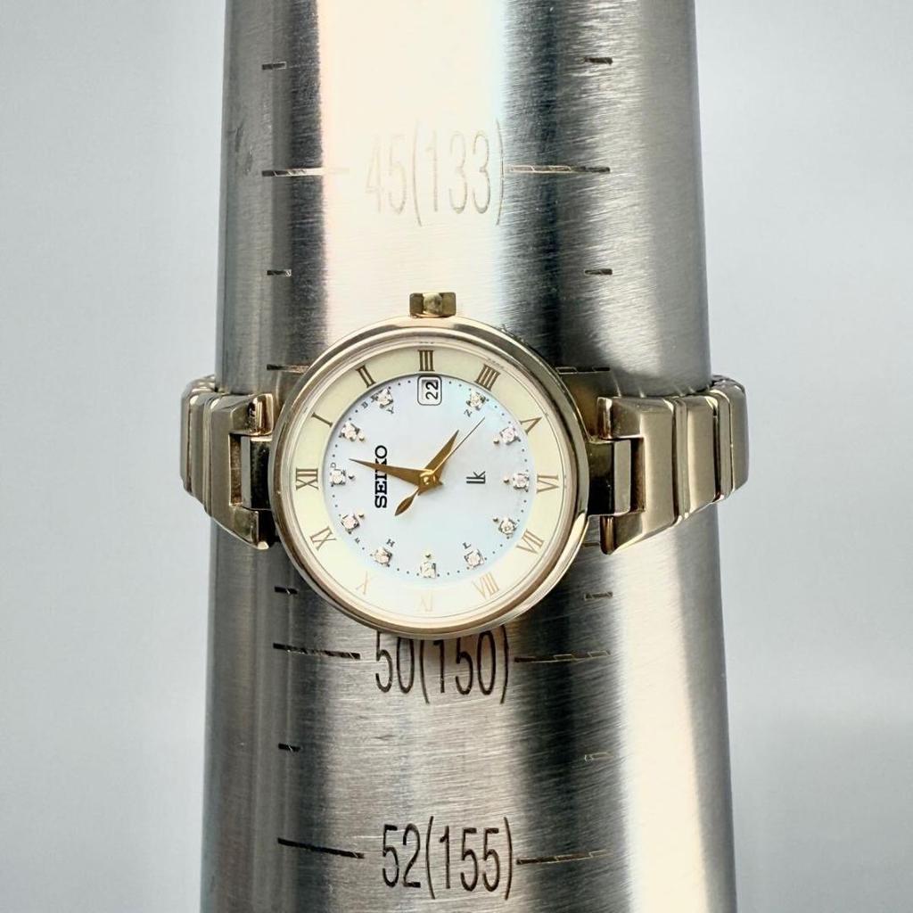 [USED] Working Seiko Lukia watch with shell dial, gold, 10 diamonds, and titanium