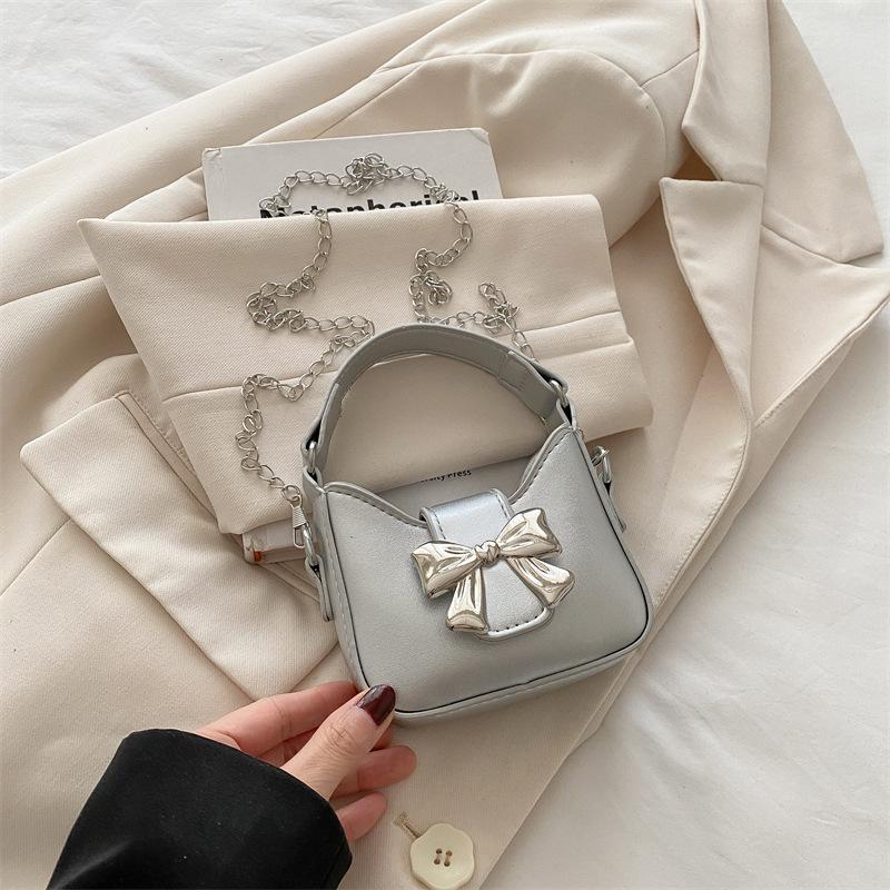 Сумка-бантик Niche 2025, новый весенне-летний тренд, милая и крутая мини-сумка-помада с цепочкой, маленькая женская сумка через плечо
