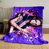 A woman with flowing petals on a vibrant purple and pink splatter background. for all seasons blanket lunch break throw gift