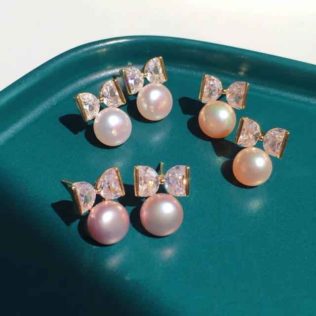 Bow natural freshwater pearl stud earrings women's light luxury high-end autumn and winter earrings new flashing zircon tide earrings