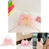 Lovely And Eye-catching Pearl Handled Bowknot Purse For Kids In Soft Pink For Daily Wear