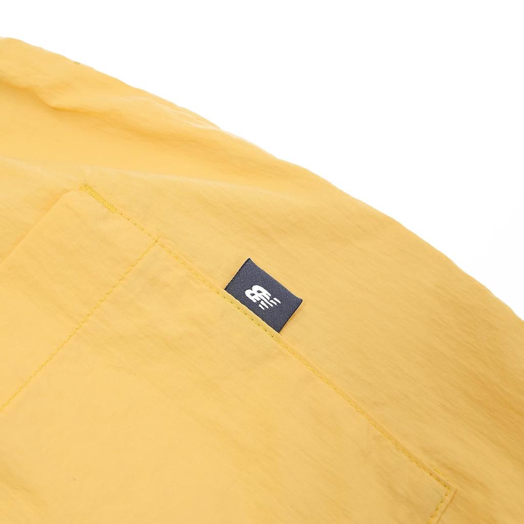 Детские тканые шорты New Balance CEE (ABS55522) (Клементина)