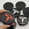 Автомобильная наклейка 2025 Новая Tesla 4 шт. ABS 56 мм Накладки на значки Tesla Model 3 Model Y Колпачки ступиц Центральные колпачки колес для Tesla Model Y X S 202