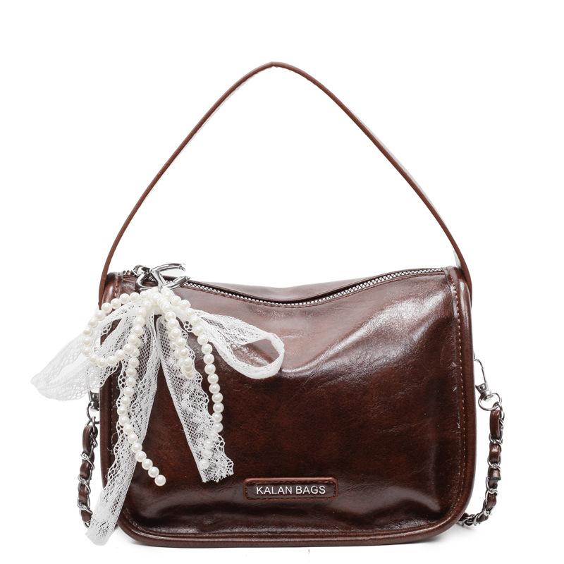 Niche high-end commuting soft leather portable pillow bag fashionable versatile casual style chain messenger bag