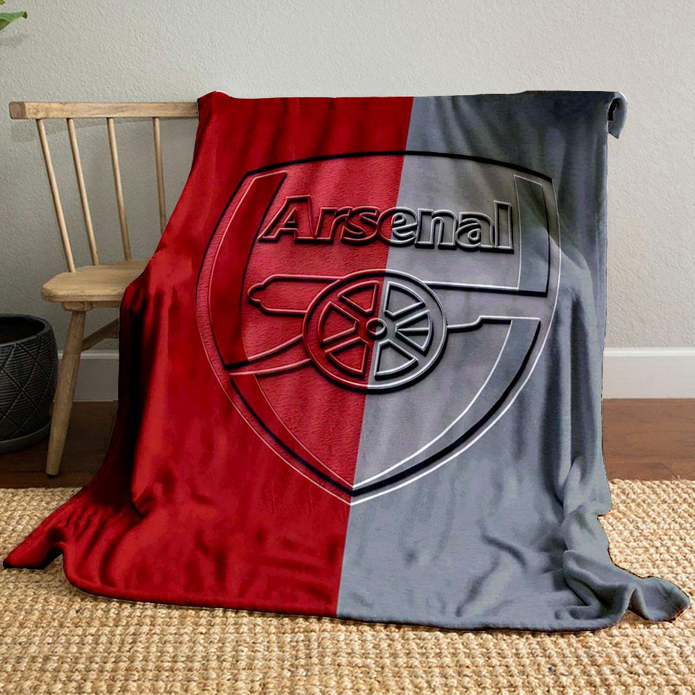 A shield logo split into red and gray halves with embossed text and a cannon. for all seasons blanket lunch break throw gift