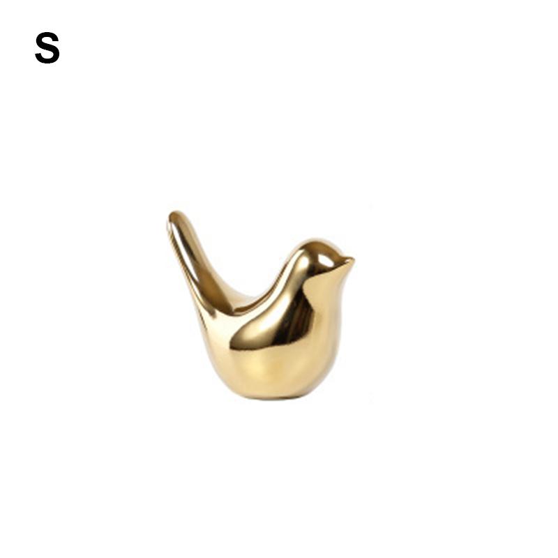 Серебряные керамические украшения в виде птиц. Роскошные простые керамические фигурки птиц. Золотые керамические фигурки птиц.