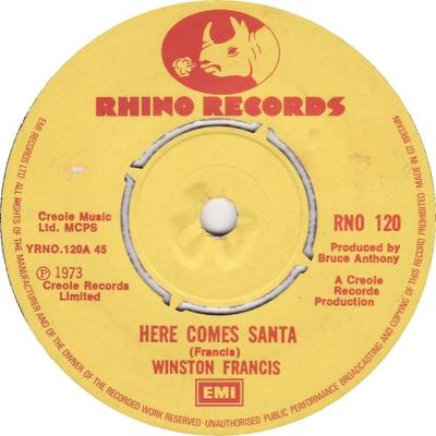 7-дюймовая пластинка WINSTON FRANCIS - Here Comes Santa / Our World Tomorr RNO120 Rhino Records 1973 UK Регги, Ска и Даб Б/У