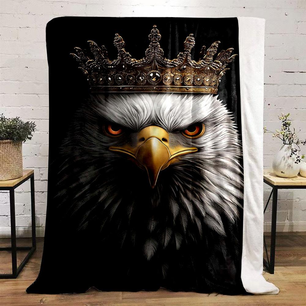 A regal eagle with detailed feathers wearing an ornate golden crown. for all seasons blanket lunch break throw gift