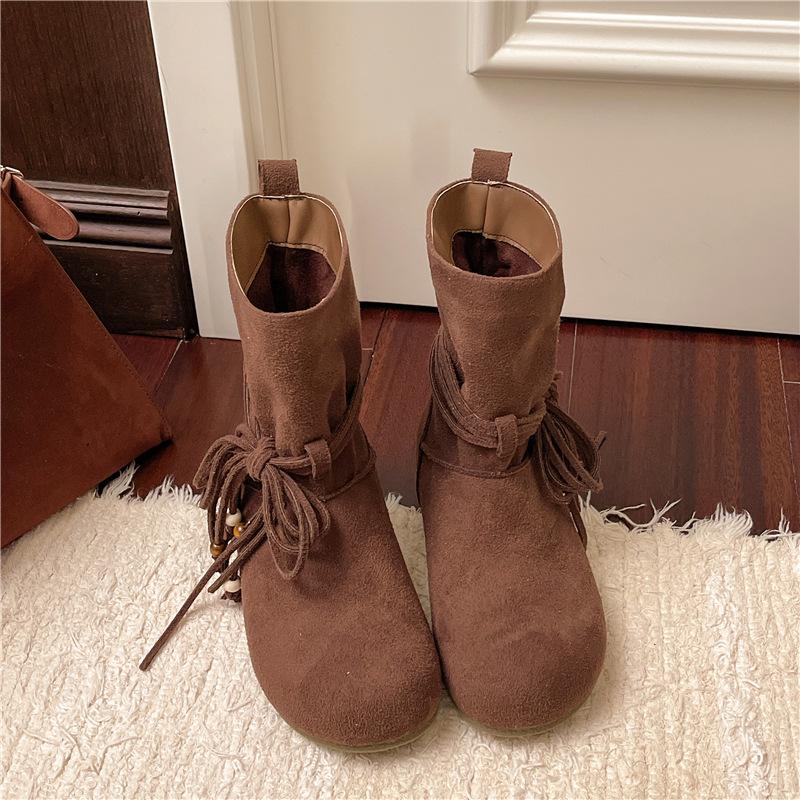 Модные женские ботильоны на шнуровке 2025 Осень Мода Замшевая плоская подошва Повседневные Челси Короткие ботильоны Ретро Кисточка Бант Боты Женские