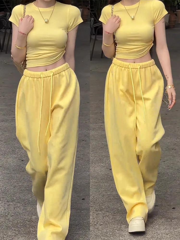 Шикарный и удобный женский летний комплект: Пикантный облегающий топ и широкие брюки