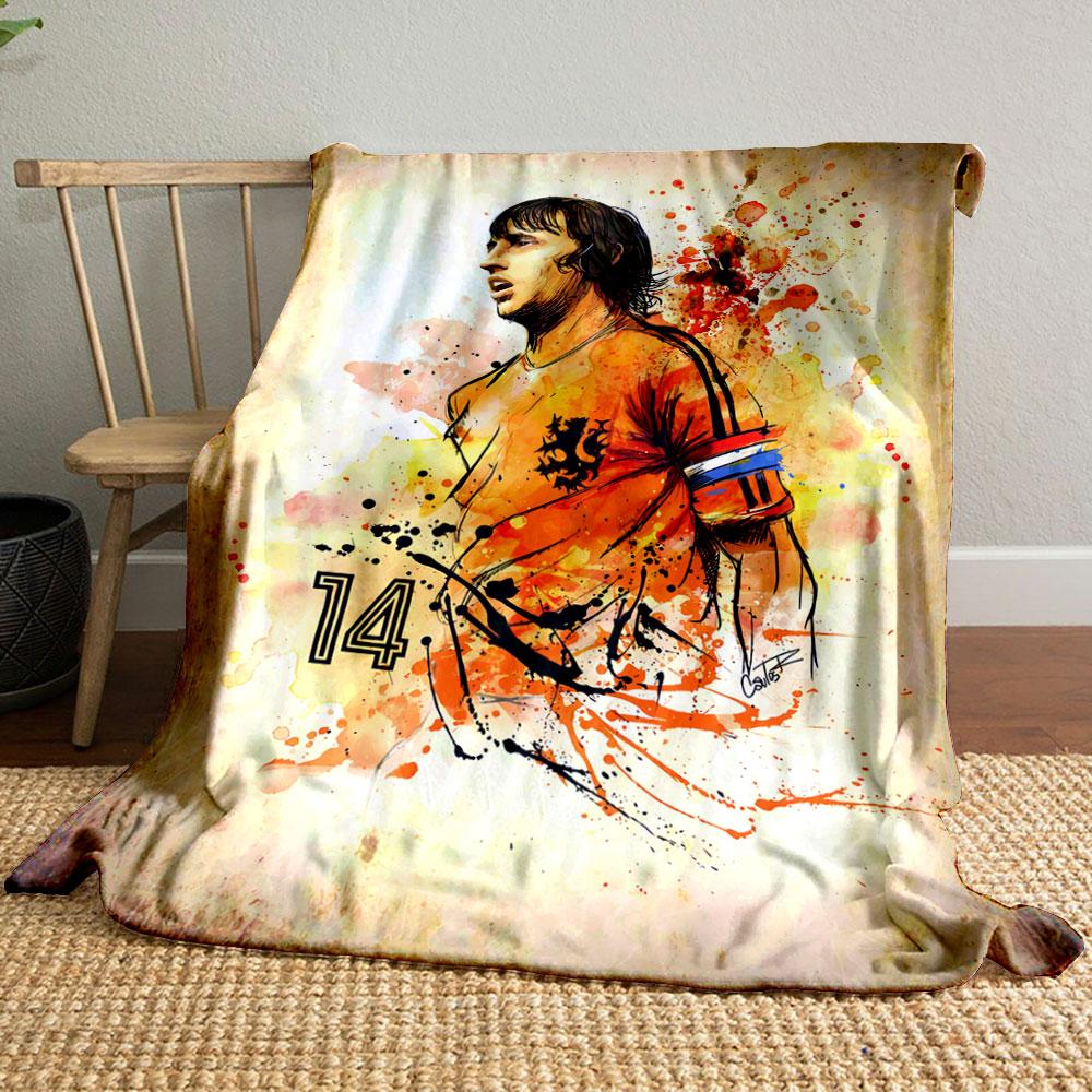 Abstract orange splatter art of a soccer player with number 14. for all seasons blanket lunch break throw gift