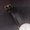 Подержанные белые часы Daniel Wellington