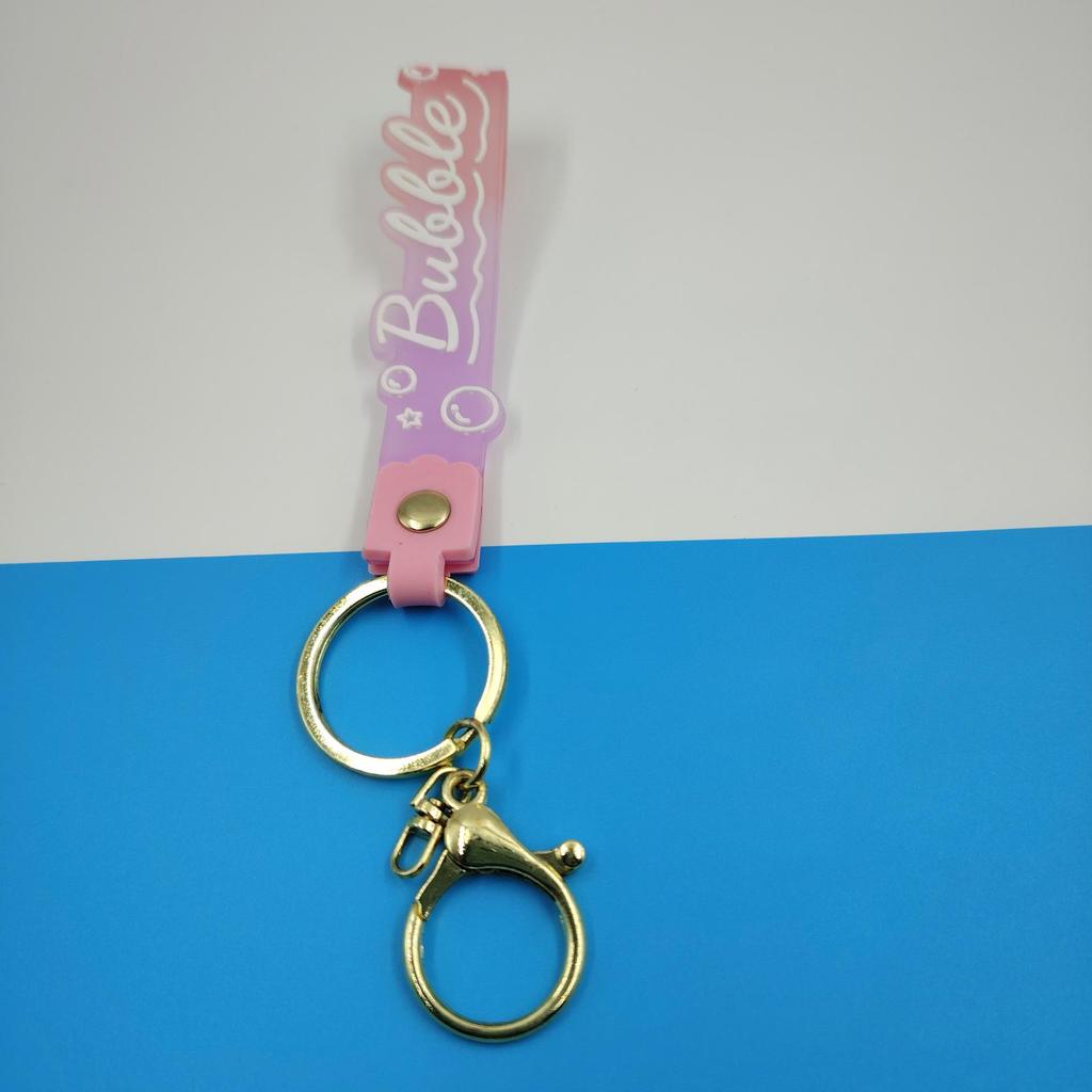 PVC Keychain with Leather Cord and Candy Soft Rubber Doll, Transparent Lanyard, and Jelly Gradient Color Hand Rope
