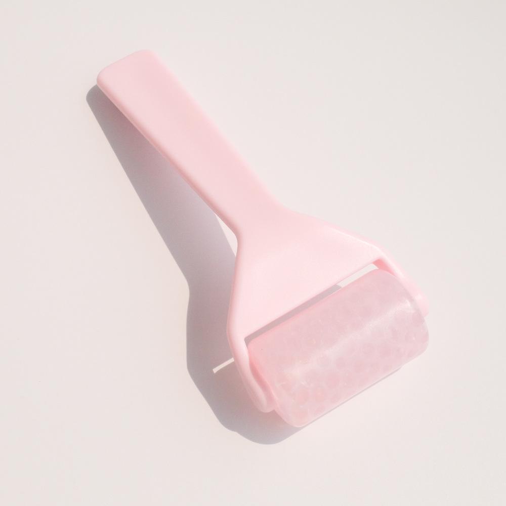 Полупрозрачный массажер-ролик для лица и кожи