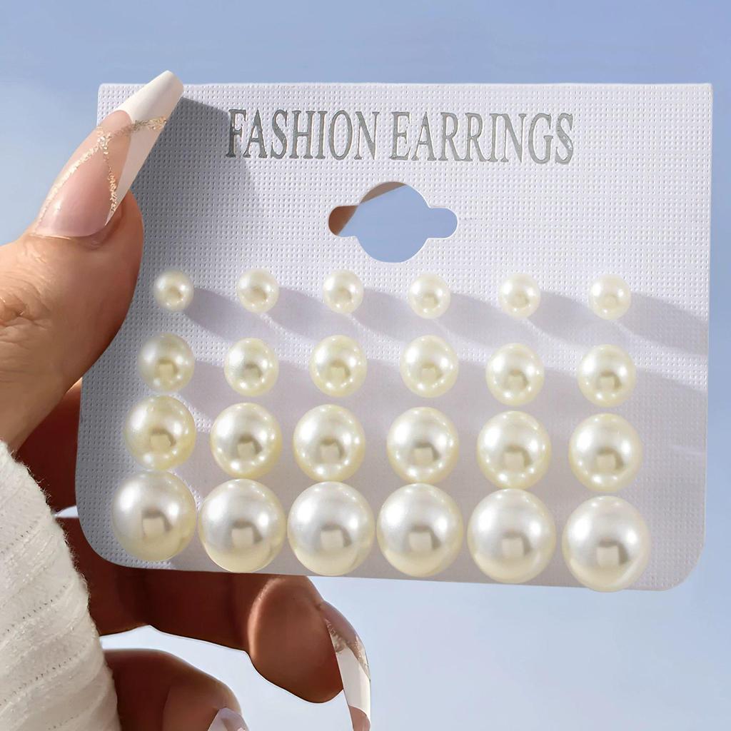 Геометрический набор серег-пусет с кристаллами, жемчугом и цирконами в форме треугольника и сердца