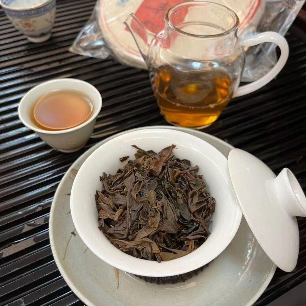 357г Юньнаньский старый пуэр Чай 2009 года Даксуешань Шэн Пуэр Чайный торт Выдержанный чай Пуэр