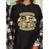 women's oversized black cotton tee with vintage cartoon beer graphic, crew neck short sleeve relaxed fit for casual weekend wear