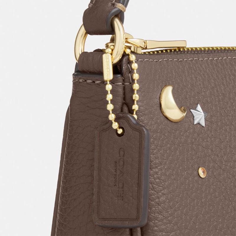 Сумка на плечо COACH Nolita 19 из канвы с фирменным узором