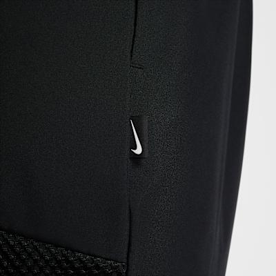 Nike Повседневные брюки мужские черные умеренно зауженные с манжетами