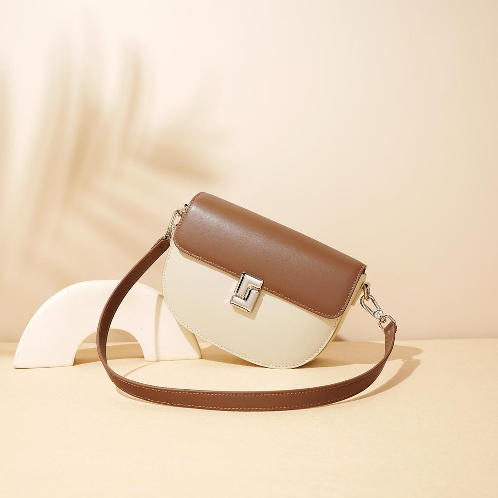 Genuine leather saddle bag for women, simple and versatile for commuting, cowhide shoulder and crossbody bag, new underarm bag with a high-end feel
