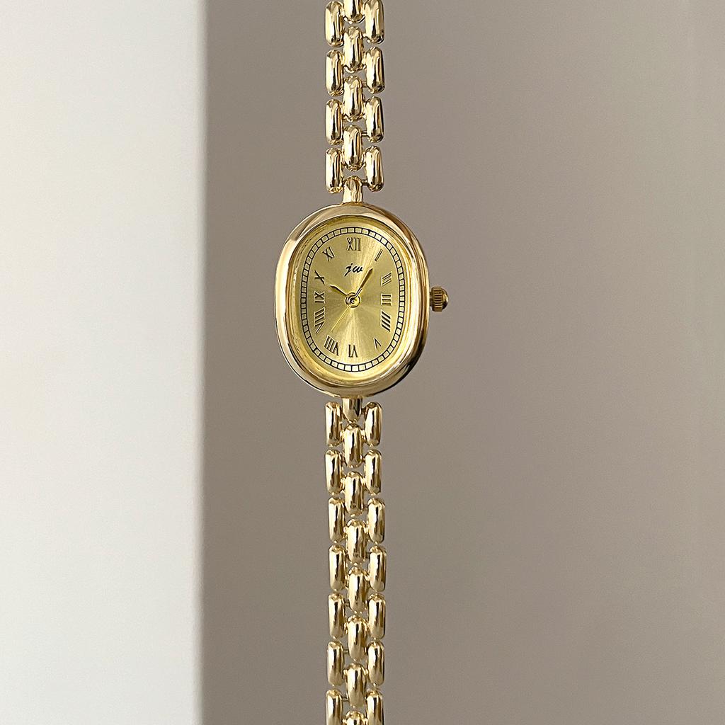 Authentic Jingwei Oval Vintage Women's Quartz Watch with Retro Roman Alloy Bracelet